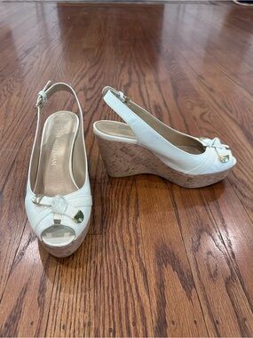 Stuart Weitzman White Patent Cork Wedge Slingbacks with Bow